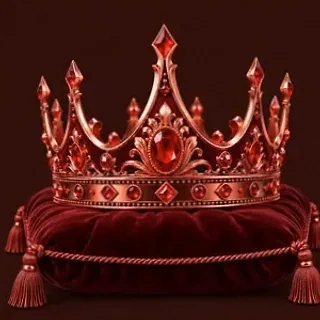 Gold crown on cushion — Mate